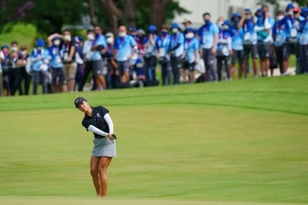 New Zealand's Lydia Ko plays a shot during the silver medal play-off of round 4 of the womens golf individual stroke play during the Tokyo 2020...