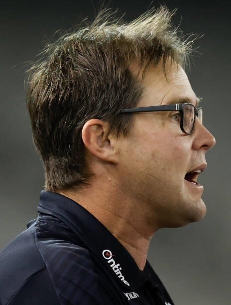 David Teague, Senior Coach of the Blues addresses his players during the 2021 AFL Round 21 match between the Carlton Blues and the Gold Coast Suns at...