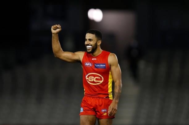 Touk Miller of the Suns celebrates as the final siren sounds during the 2021 AFL Round 21 match between the Carlton Blues and the Gold Coast Suns at...