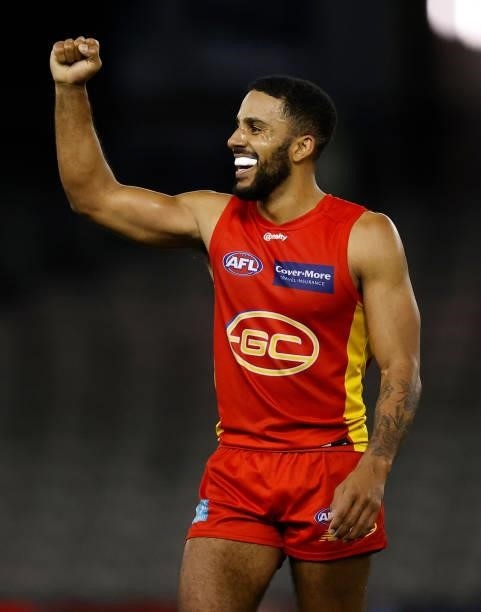 Touk Miller of the Suns celebrates as the final siren sounds during the 2021 AFL Round 21 match between the Carlton Blues and the Gold Coast Suns at...