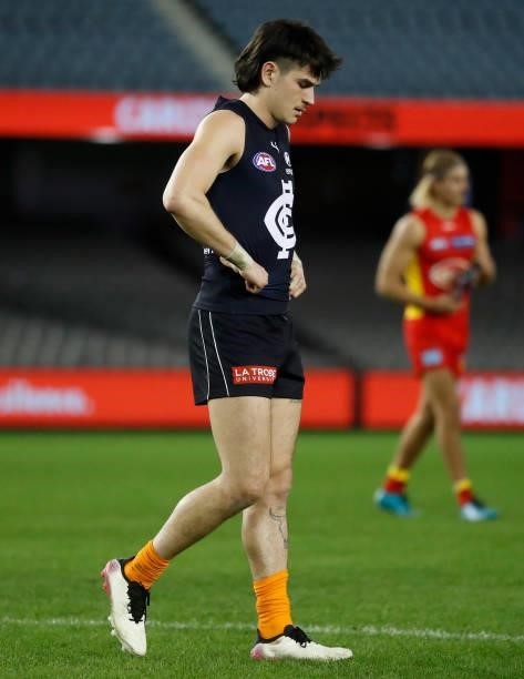Zac Fisher of the Blues looks dejected after a loss during the 2021 AFL Round 21 match between the Carlton Blues and the Gold Coast Suns at Marvel...
