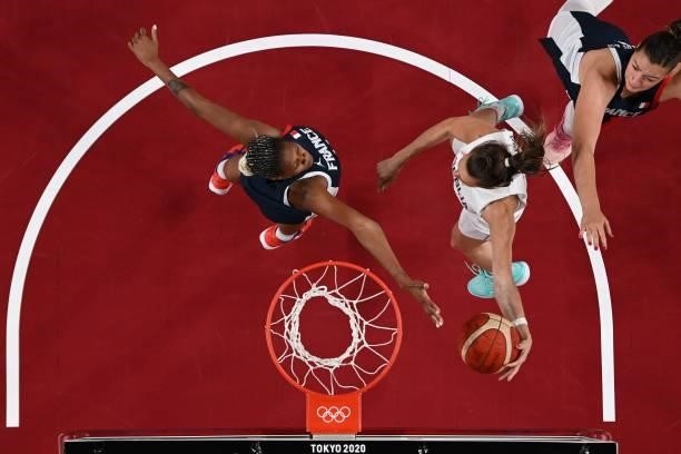 France's Valeriane Vukosavljevic reaches out to the ball in the women's bronze medal basketball match between Serbia and France during the Tokyo 2020...