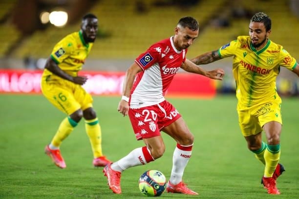 Ruben AGUILAR of Monaco and FABIO of Nantes during the Ligue 1 football match between Monaco and Nantes at Stade Louis II on August 6, 2021 in...