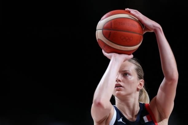 France's Marine Johannes shoots the ball in the women's bronze medal basketball match between Serbia and France during the Tokyo 2020 Olympic Games...