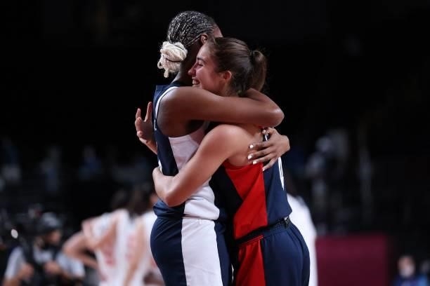 France's Marine Fauthoux and Valeriane Vukosavljevic celebrate their win in the women's bronze medal basketball match between Serbia and France...