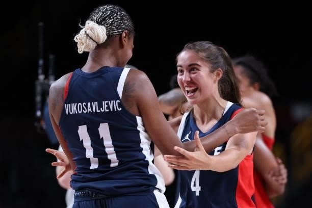 France's Marine Fauthoux and Valeriane Vukosavljevic celebrate their win in the women's bronze medal basketball match between Serbia and France...