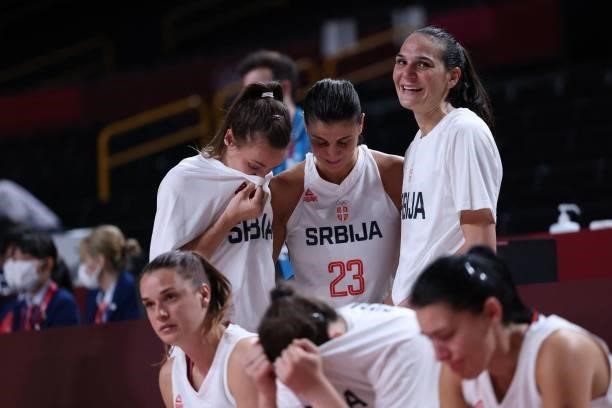 Serbian players react after losing the women's bronze medal basketball match between Serbia and France during the Tokyo 2020 Olympic Games at the...