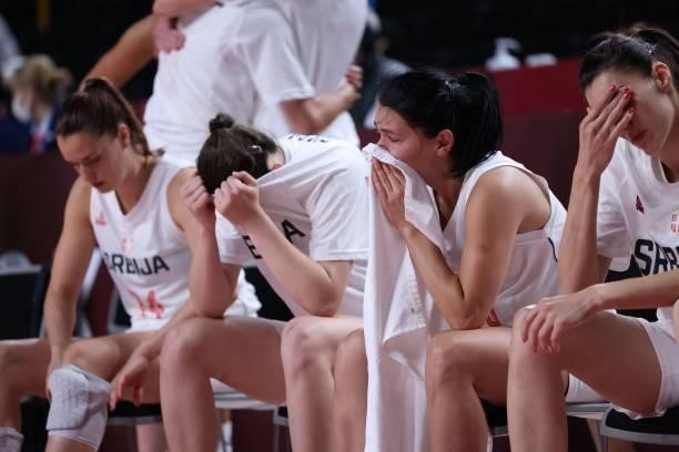 Serbian players react after losing the women's bronze medal basketball match between Serbia and France during the Tokyo 2020 Olympic Games at the...