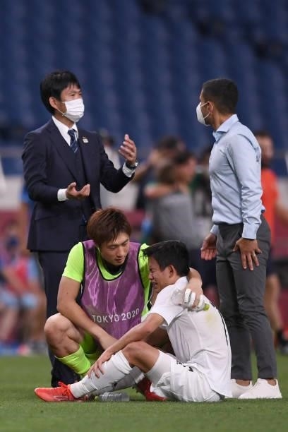 Takefusa Kubo of Japan cries after the loss against Mexico after the 3rd place match on Day 14 of the Tokyo 2020 Olympic Games at Saitama Stadium on...