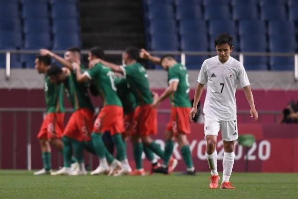 Takefusa Kubo of Japan appears dejected after Alexis Vega of Mexico scores the 3rd goal during the 3rd place match of the Men's Football between...
