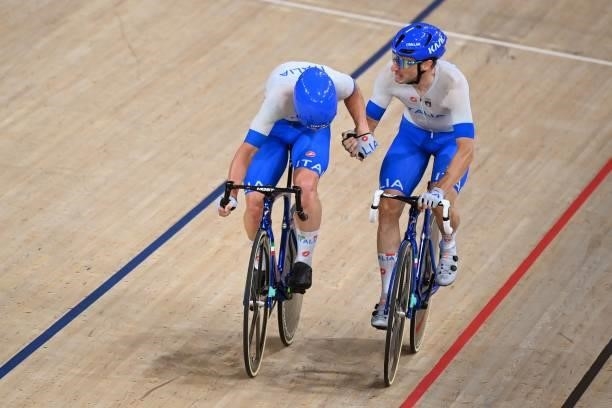 Italy's Elia Viviani and Italy's Simone Consonni in action in the men's track cycling madison final during the Tokyo 2020 Olympic Games at Izu...