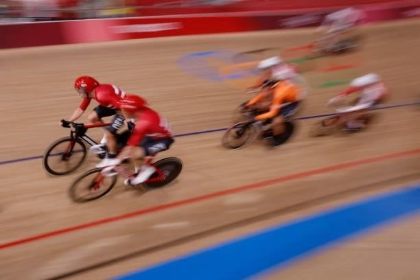 Denmark's Lasse Norman Hansen and Michael Morkov compete in the men's track cycling madison final during the Tokyo 2020 Olympic Games at Izu...