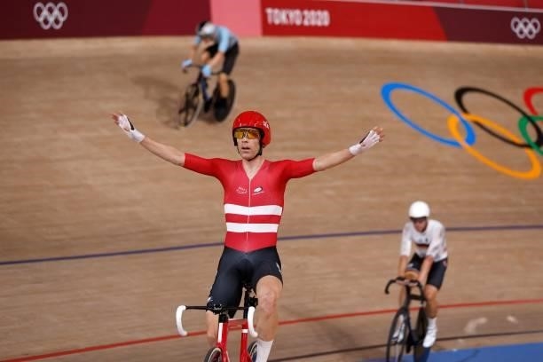 Gold medallist Denmark's Michael Morkov celebrates after winning in the men's track cycling madison final during the Tokyo 2020 Olympic Games at Izu...