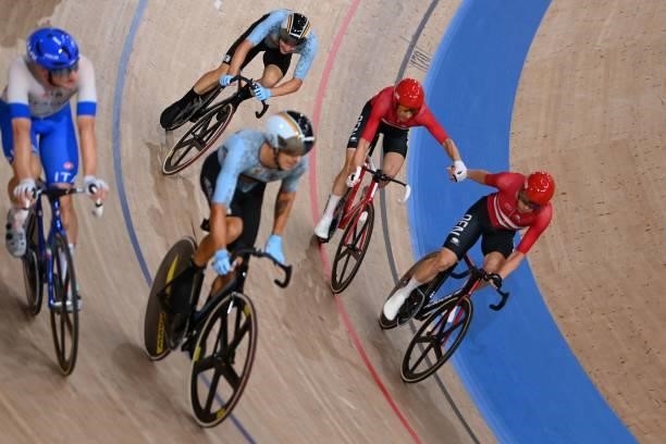 Denmark's Michael Morkov and Denmark's Lasse Norman Hansen in action in the men's track cycling madison final during the Tokyo 2020 Olympic Games at...