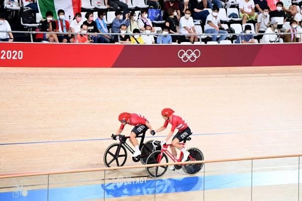 Denmark's Lasse Norman Hansen and Michael Morkov in action in the men's track cycling madison final during the Tokyo 2020 Olympic Games at Izu...