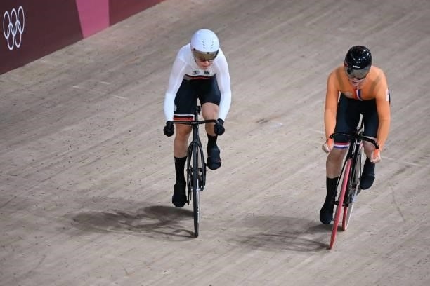 Germany's Emma Hinze and Netherlands' Shanne Braspennincx compete in the women's track cycling sprint quarter-finals during the Tokyo 2020 Olympic...