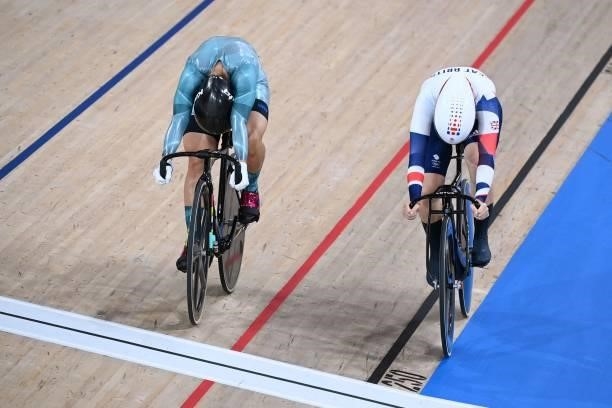 Britain's Katy Marchant and Hong Kong's Lee Wai Sze compete in the women's track cycling sprint quarter-finals during the Tokyo 2020 Olympic Games at...