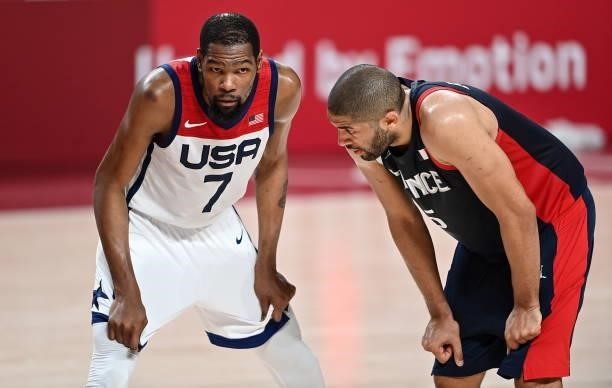 Tokyo , Japan - 7 August 2021; Kevin Durant of USA, left, and Nicolas Batum of France during the men's gold medal match between the USA and France at...