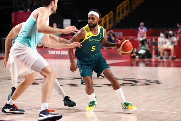 Patty Mills of the Australia Men's National Team dribbles the ball during the game against the Slovenia Men's National Team during the Bronze Medal...