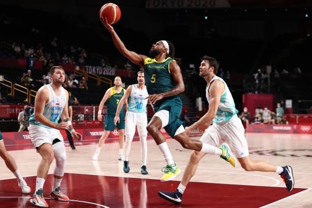 Patty Mills of the Australia Men's National Team drives to the basket during the game against the Slovenia Men's National Team during the Bronze...