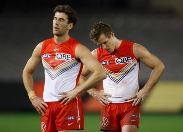 Robbie Fox and Luke Parker of the Swans look dejected after a loss during the 2021 AFL Round 21 match between the St Kilda Saints and the Sydney...