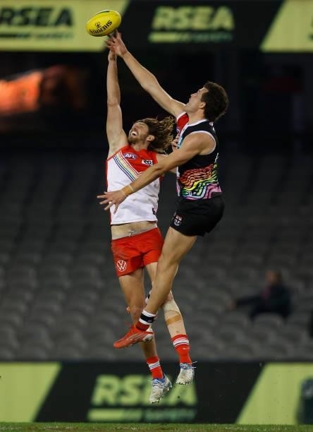 Rowan Marshall of the Saints and Tom Hickey of the Swans compete in a ruck contest during the 2021 AFL Round 21 match between the St Kilda Saints and...