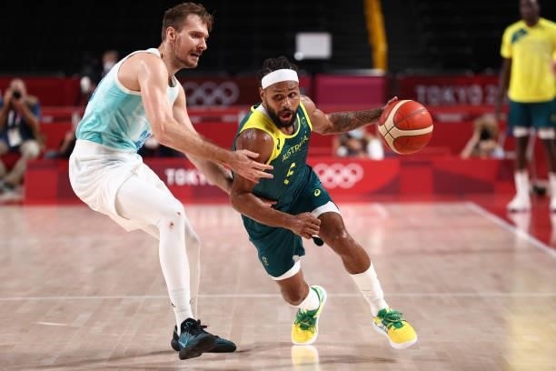 Patty Mills of the Australia Men's National Team dribbles the ball during the game against the Slovenia Men's National Team during the Bronze Medal...