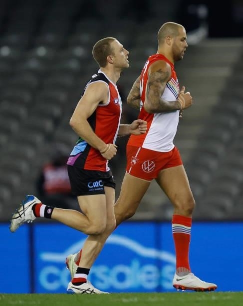 Callum Wilkie of the Saints and Lance Franklin of the Swans in action during the 2021 AFL Round 21 match between the St Kilda Saints and the Sydney...
