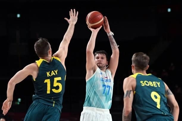 Slovenia's Luka Doncic takes a shot past Australia's Nic Kay in the men's bronze medal basketball match between Slovenia and Australia during the...
