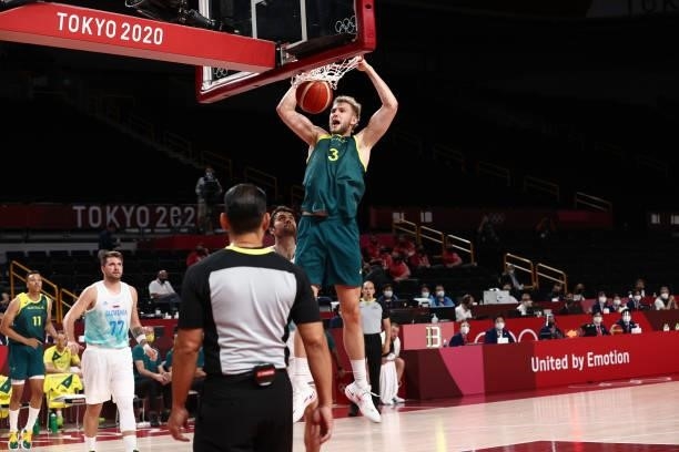 Jock Landale of the Australia Men's National Team dunks the ball against the Slovenia Men's National Team during the Bronze Medal Game of the 2020...
