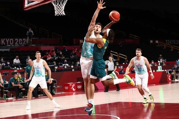 Patty Mills of the Australia Men's National Team drives to the basket against the Slovenia Men's National Team during the Bronze Medal Game of the...