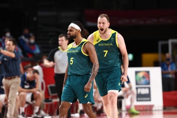 Patty Mills and Joe Ingles of the Australia Men's National Team celebrate during the game against the Slovenia Men's National Team during the Bronze...