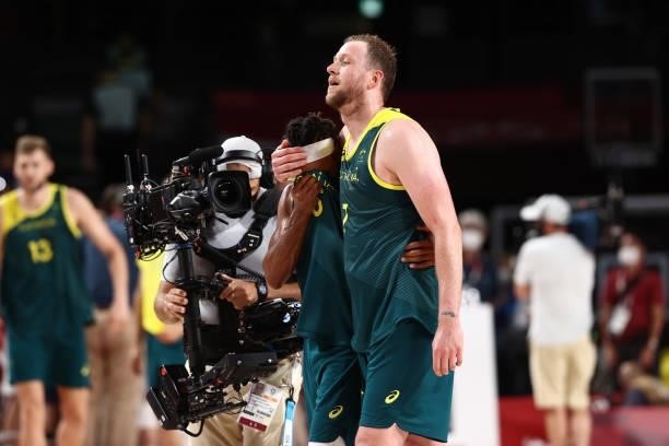 Joe Ingles and Patty Mills of the Australia Men's National Team celebrate after the game against the Slovenia Men's National Team during the Bronze...