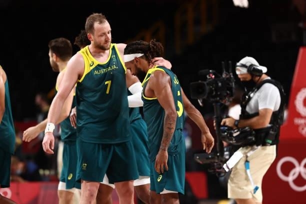 Joe Ingles and Patty Mills of the Australia Men's National Team celebrate after the game against the Slovenia Men's National Team during the Bronze...