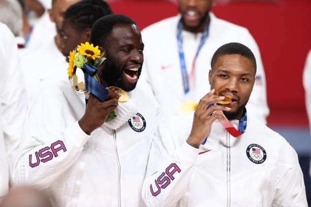 Draymond Green and Damian Lillard of the USA Men's National Team celebrate after winning the Gold Medal Game of the 2020 Tokyo Olympics on August 7,...