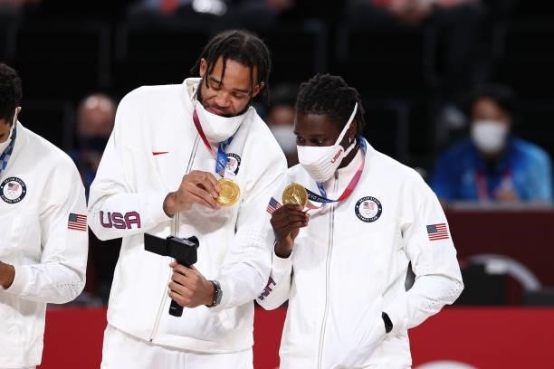 JaVale McGee and Jrue Holiday of the USA Men's National Team pose for a photo after winning the Gold Medal Game of the 2020 Tokyo Olympics on August...