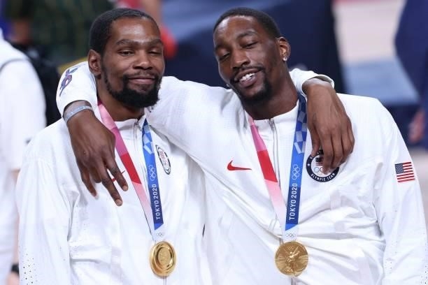 First placed team USA's Kevin Wayne Durant and Edrice Femi Adebayo pose for pictures with their gold medals on the podium during the medal ceremony...