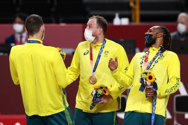 Joe Ingles and Patty Mills of the Australia Men's National Team celebrate after winning the Bronze Medal during the 2020 Tokyo Olympics on August 7,...