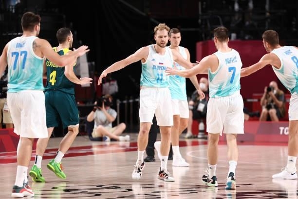 Jaka Blazic of the Slovenia Men's National Team hi-fives teammates during the game against the Australia Men's National Team during the Bronze Medal...