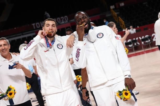Zach LaVine and Draymond Green of the USA Men's National Team pose for a picture during the Medal Ceremony of the 2020 Tokyo Olympics at the Saitama...