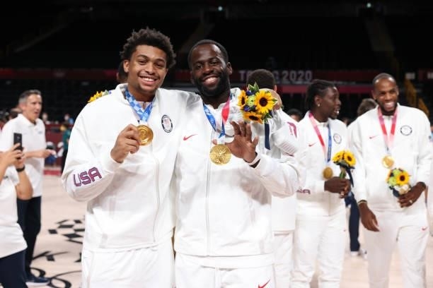 Keldon Johnson and Draymond Green of the USA Men's National Team pose for a picture during the Medal Ceremony of the 2020 Tokyo Olympics at the...