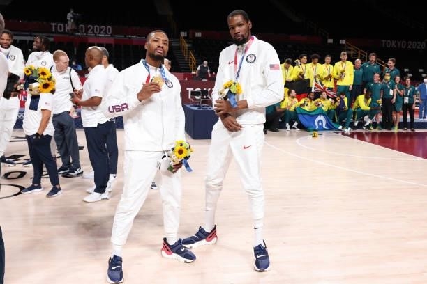 Damian Lillard and Kevin Durant of the USA Men's National Team pose for a picture during the Medal Ceremony of the 2020 Tokyo Olympics at the Saitama...