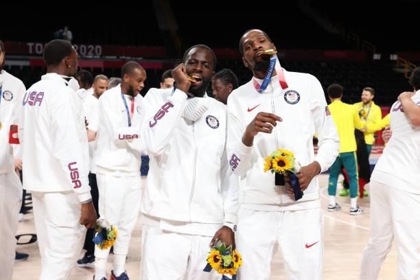 Draymond Green and Kevin Durant of the USA Men's National Team pose for a picture during the Medal Ceremony of the 2020 Tokyo Olympics at the Saitama...