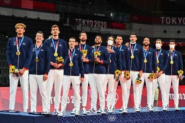 Team of France celebrates the victory with the gold medal during the Men's Final match between ROC and France at Ariake Arena on August 7, 2021 in...
