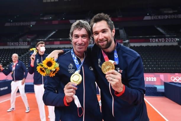 Laurent TILLIE coach of France celebrates the victory with his son Kevin TILLIE of France with the gold medal during the Men's Final match between...