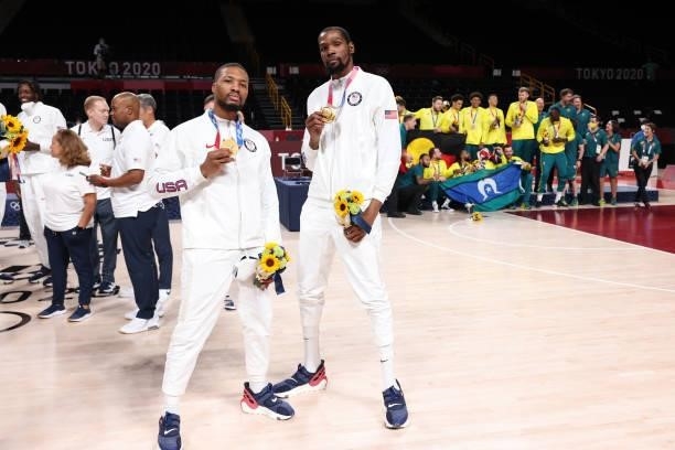 Damian Lillard and Kevin Durant of the USA Men's National Team pose for a picture during the Medal Ceremony of the 2020 Tokyo Olympics at the Saitama...