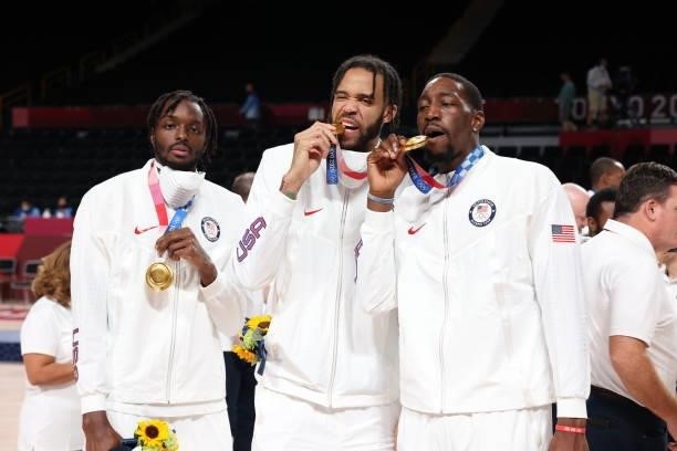Jerami Grant, JaVale McGee and Bam Adebayo of the USA Men's National Team pose for a picture during the Medal Ceremony of the 2020 Tokyo Olympics at...