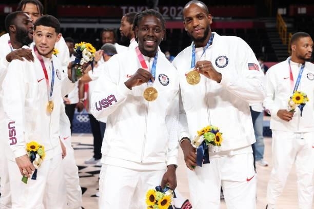 Jrue Holiday and Khris Middleton of the USA Men's National Team pose for a picture during the Medal Ceremony of the 2020 Tokyo Olympics at the...