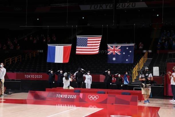 The flags of France, the United States of America and Australia during the Medal Ceremony of the 2020 Tokyo Olympics at the Saitama Super Arena on...