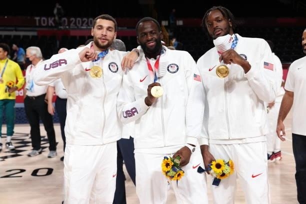 Zach LaVine, Draymond Green and Jerami Grant of the USA Men's National Team pose for a picture during the Medal Ceremony of the 2020 Tokyo Olympics...